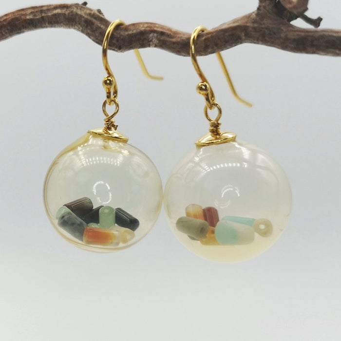 earrings and gems
